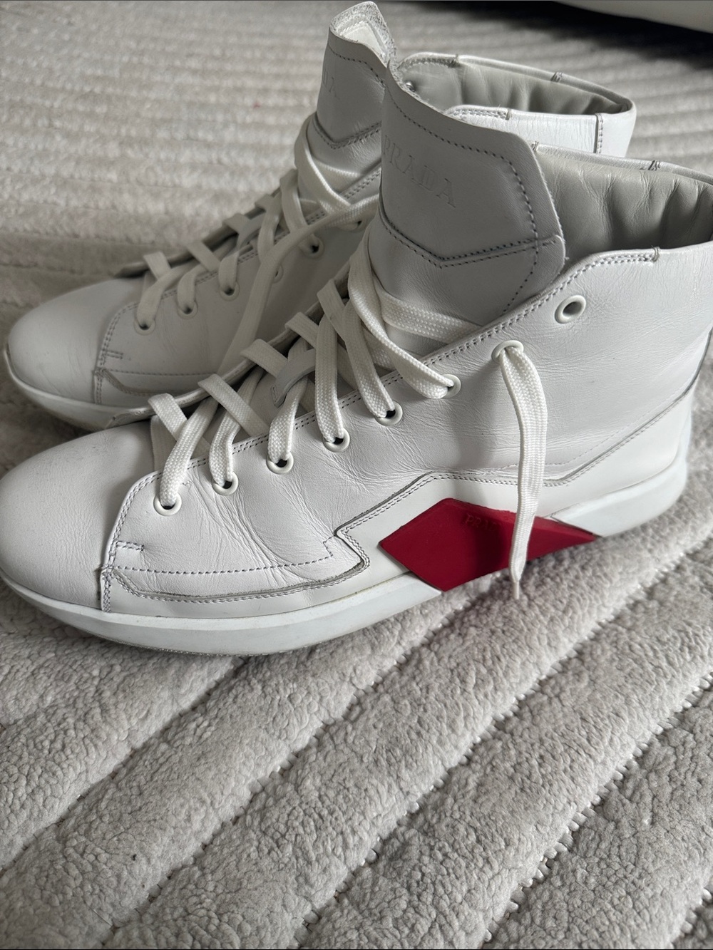 Prada White Leather High-Top Sneakers with Red Accent